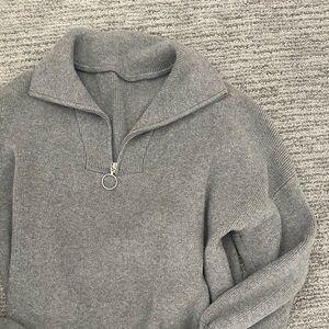 gray knitted half zip